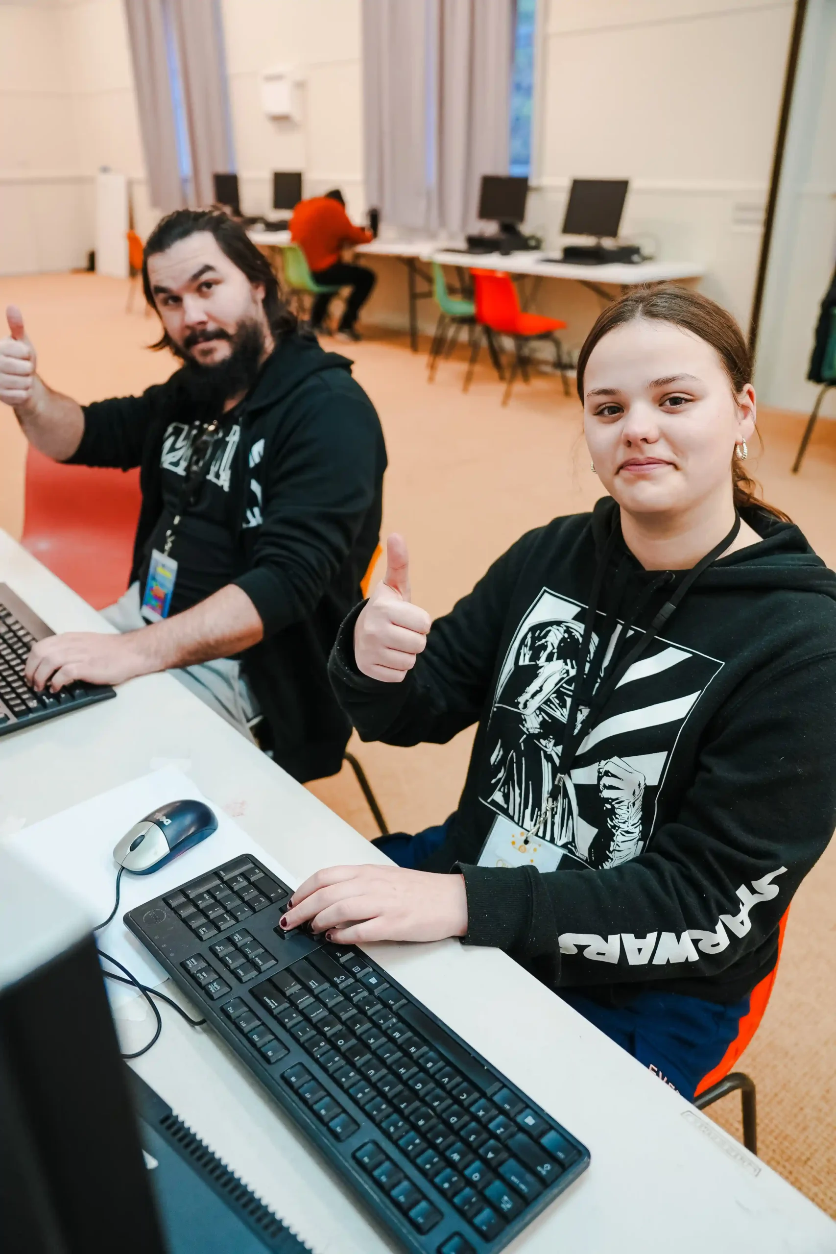 CrüTech campers giving a thumbs up at camp